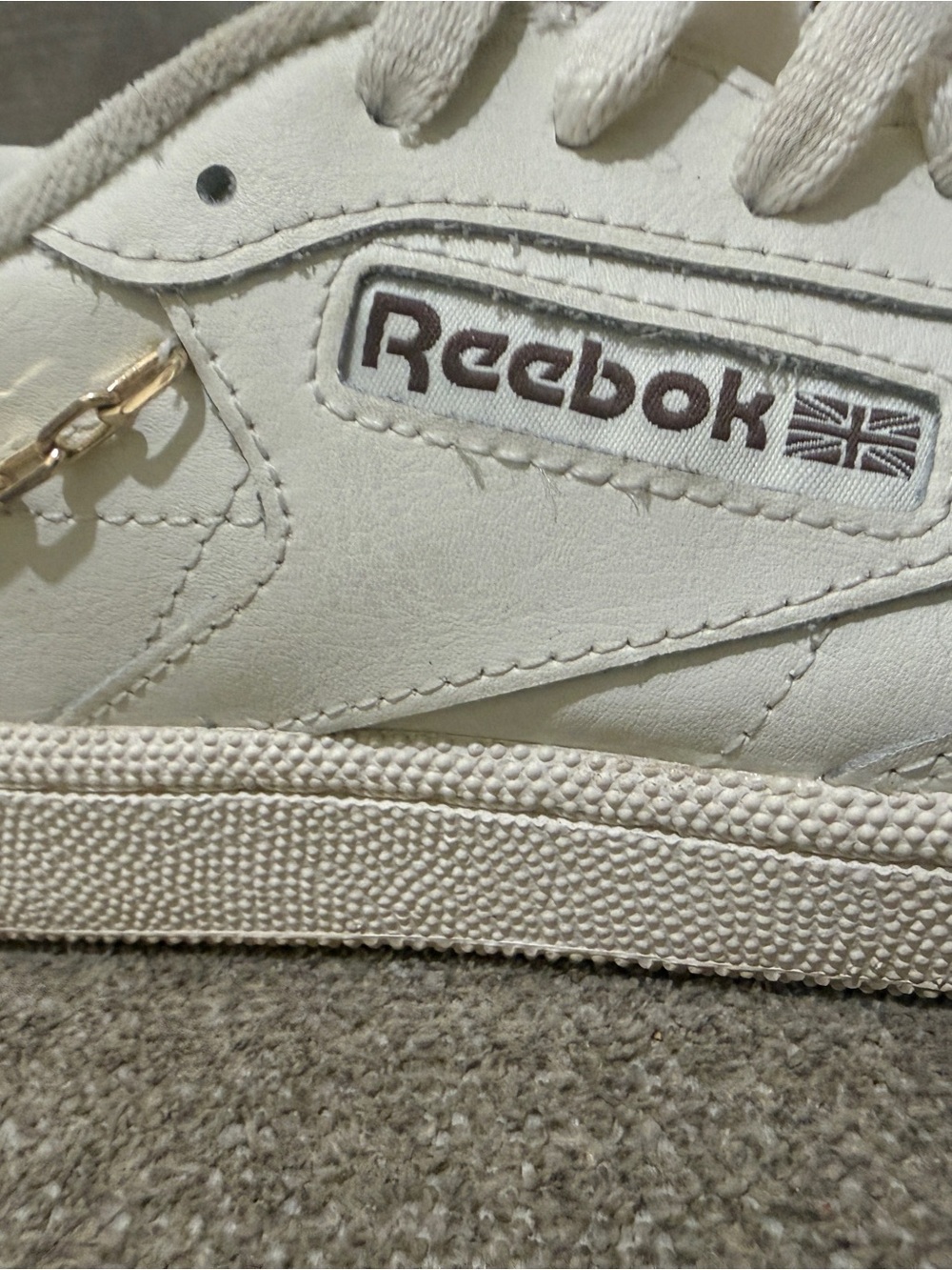 Reebok Women's White Leather Sneakers with Subtle Branding